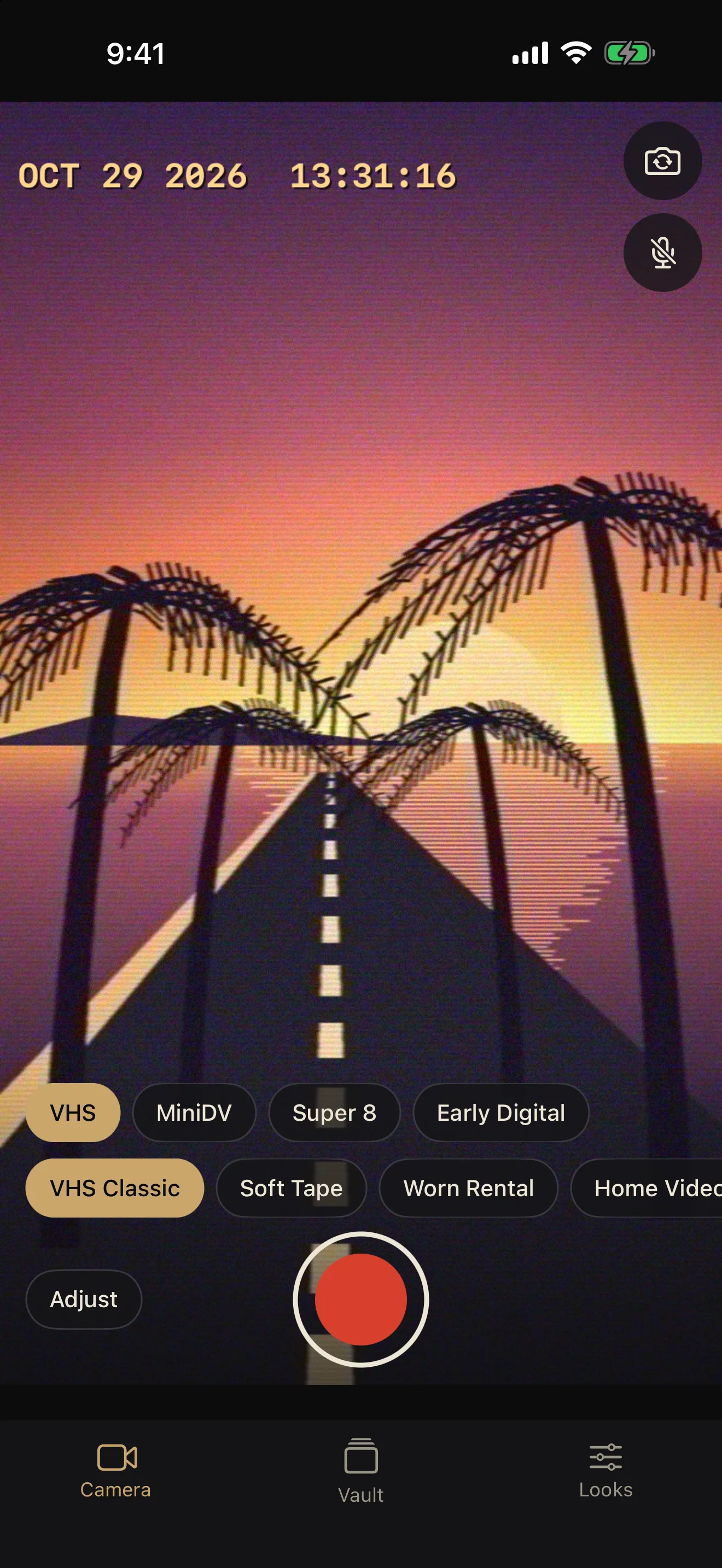 Camera screen showing a sunset road scene with a VHS look and a date stamp